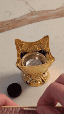 lighting coal with match